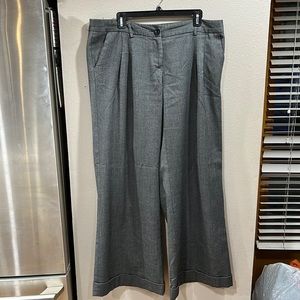 Gray wide leg cuffed trousers. Sits on the hips.